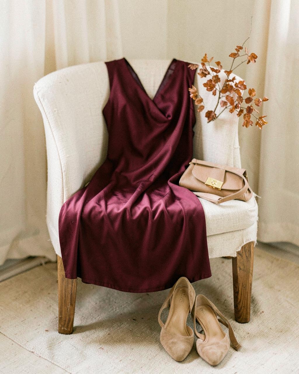 Autumn wedding guest styling in warm neutral tones