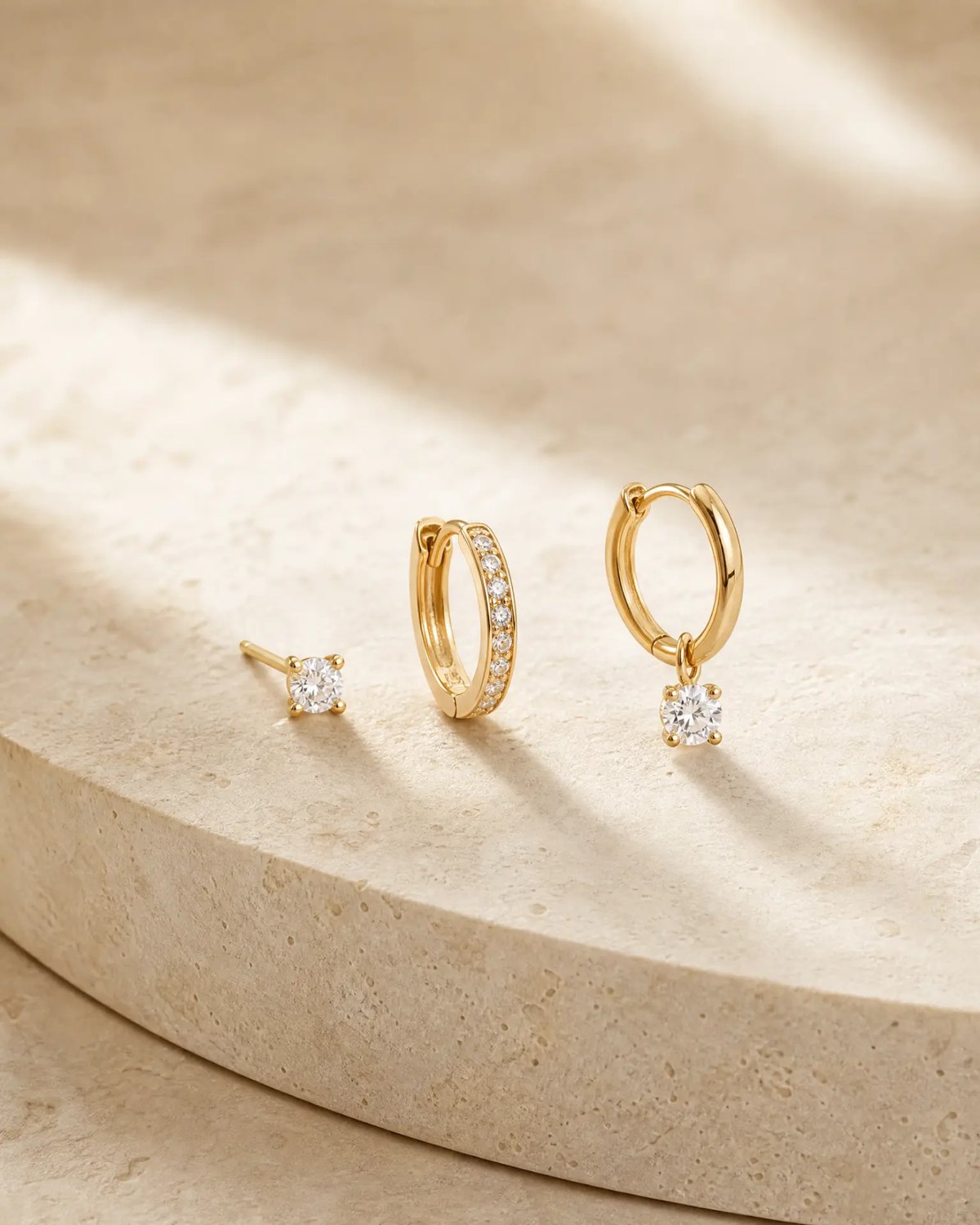 Editorial inspiration for refined gold huggie earrings