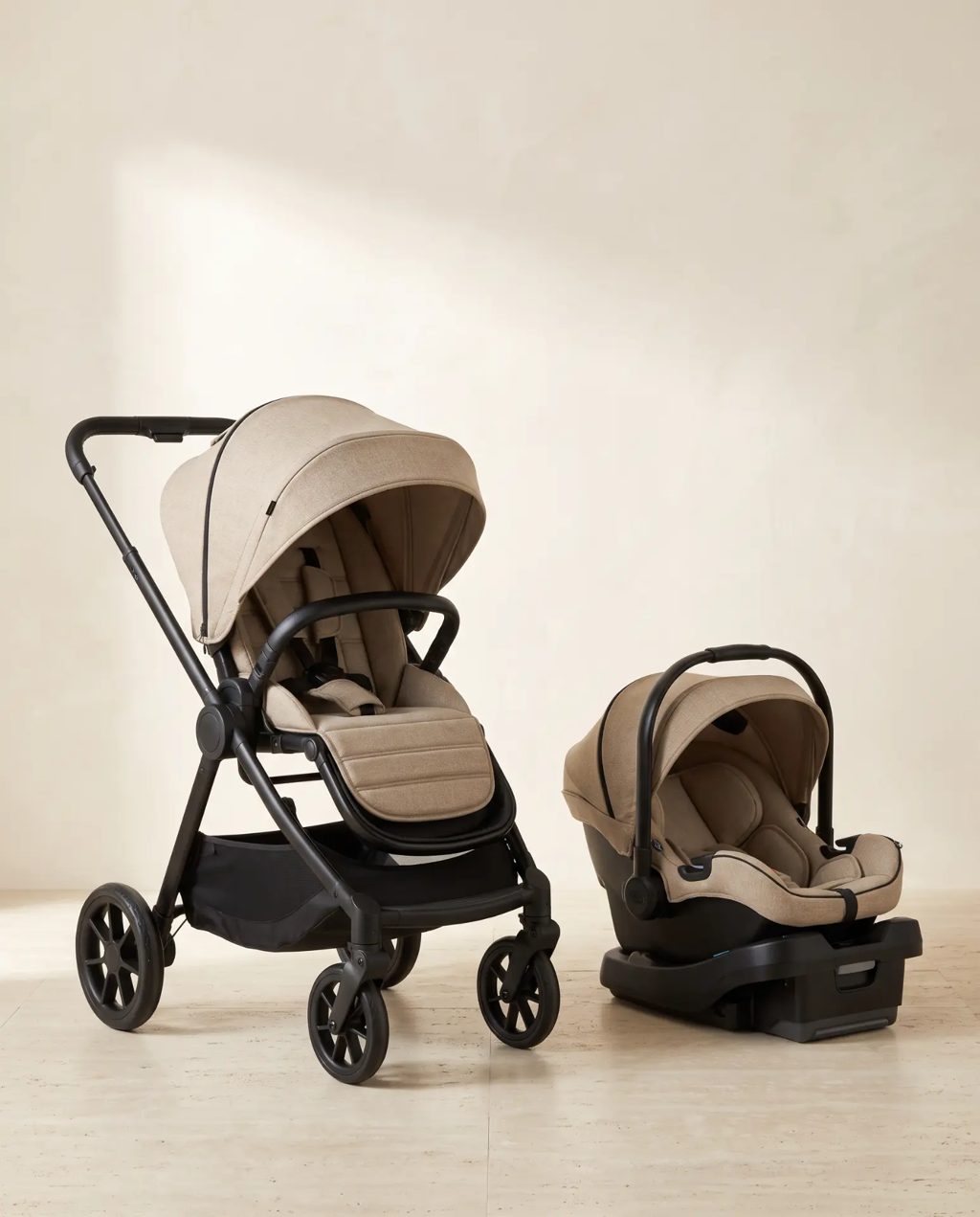Editorial inspiration: a beige stroller with matching infant car seat and base
