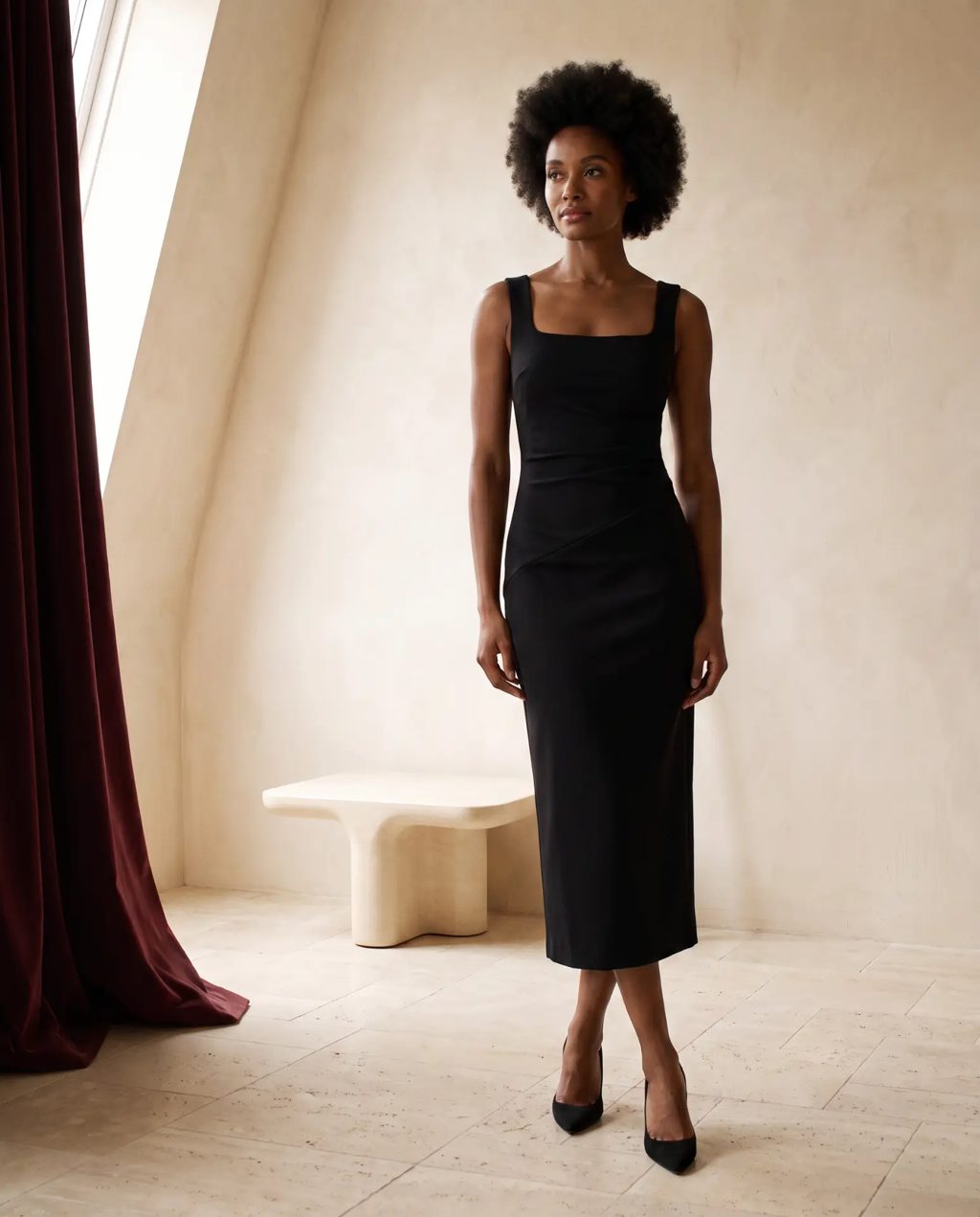 Editorial inspiration: a black square-neck fitted midi dress