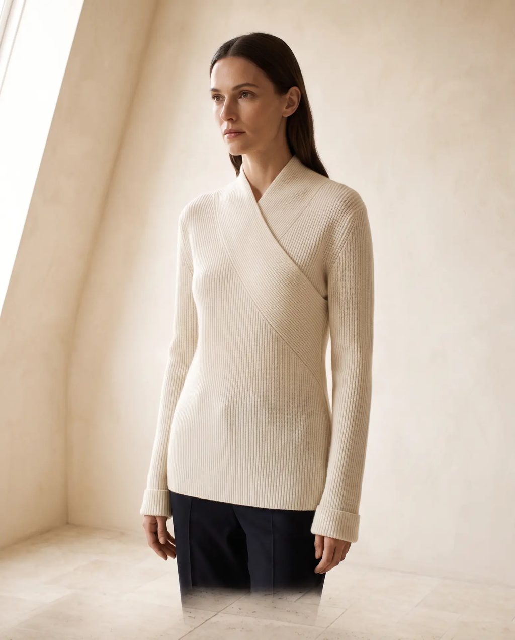 Editorial inspiration: a cream crossover ribbed knit sweater