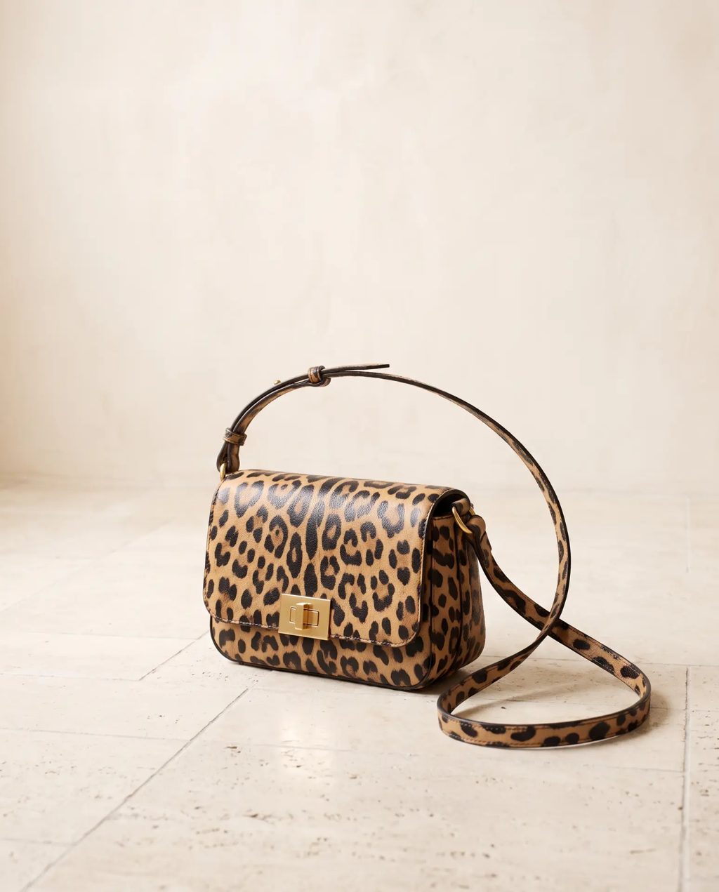 Editorial inspiration: a leopard-print flap crossbody bag with gold turn-lock