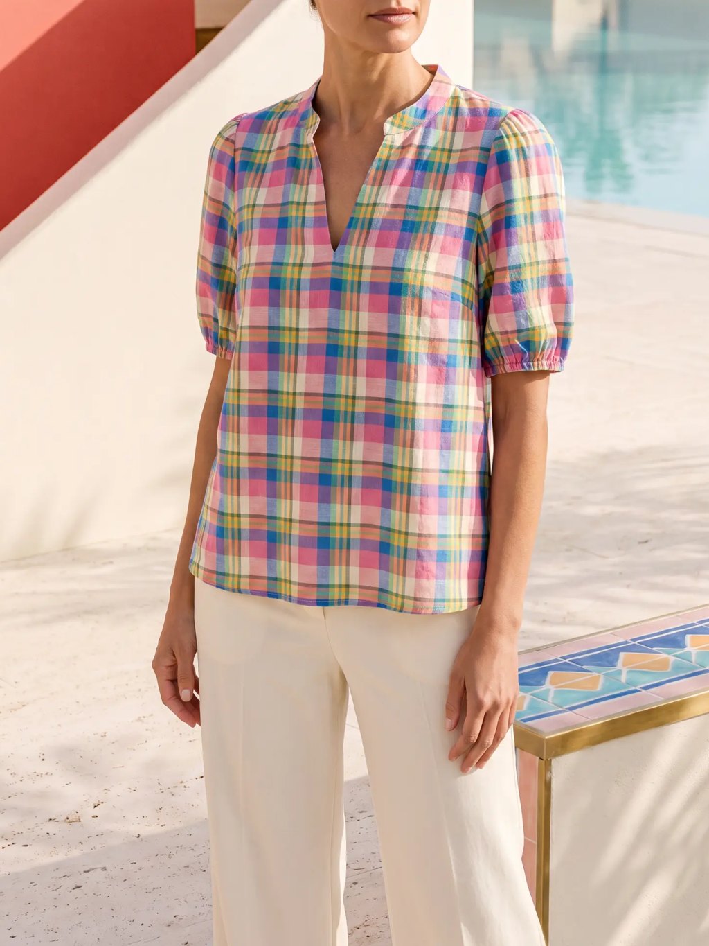 Editorial inspiration for a rainbow plaid puff-sleeve top