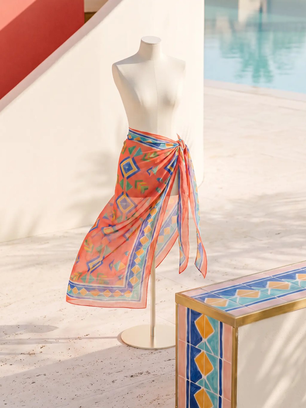 Editorial inspiration for a coral geometric print sarong