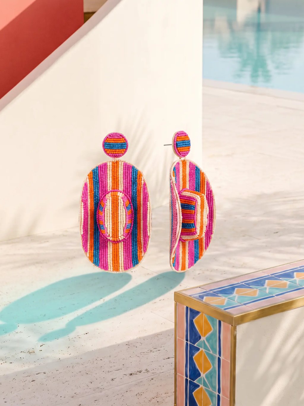 Editorial inspiration for colorful striped beaded rancher earrings